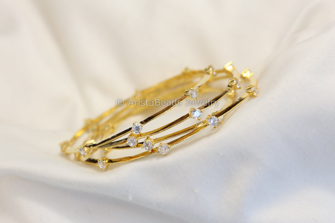 Gold Solitaire CZ Bangle Set ( Set of 4)
