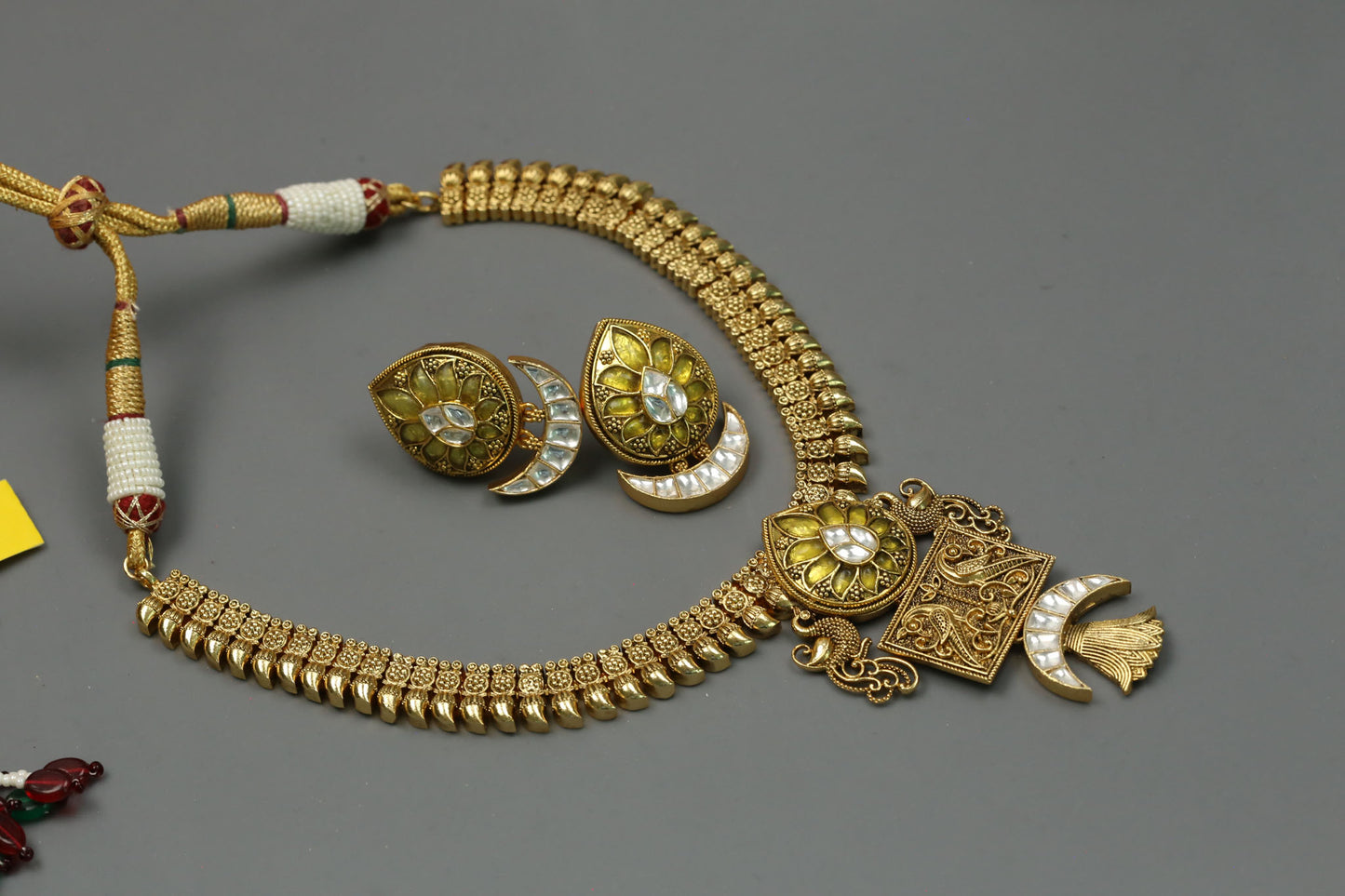 Sona Antique Gold Kundan Necklace Set - Yellow