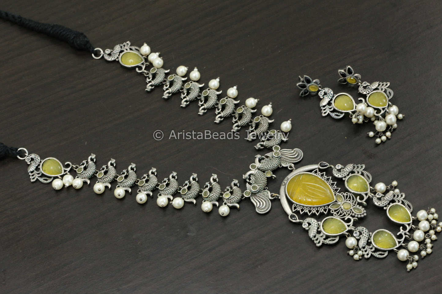 Carved Stone Oxidized Peacock Necklace Set - Yellow