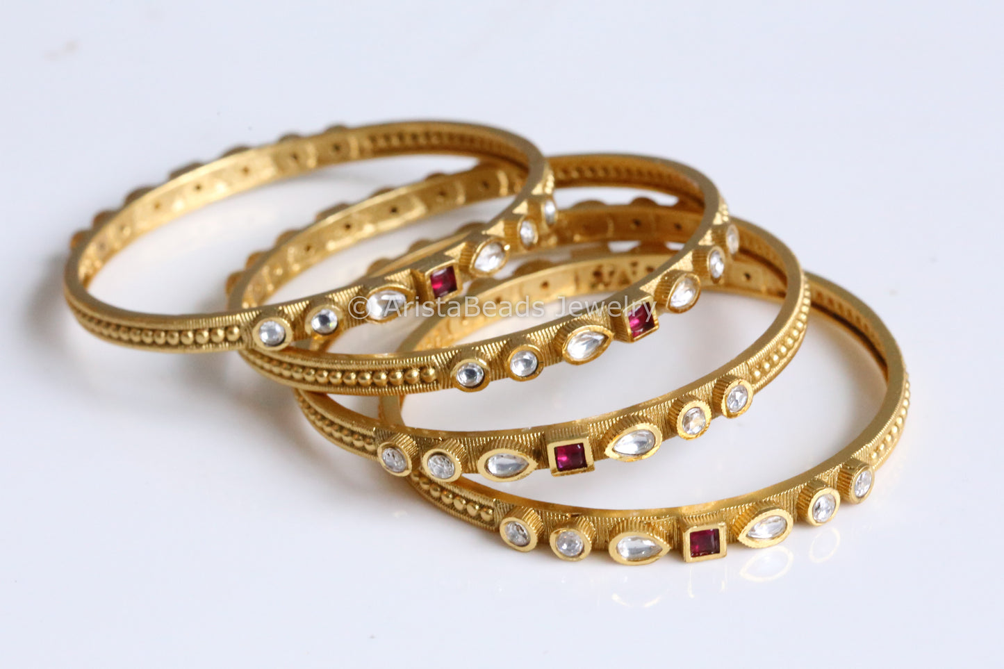 Antique Gold Kundan Bangle Set (set of 4)