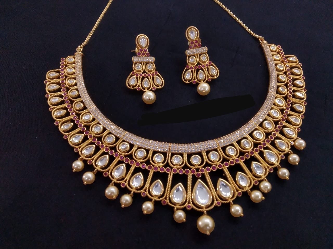 Delicate Uncut Foil Kundan Hasli Necklace Set - Ruby