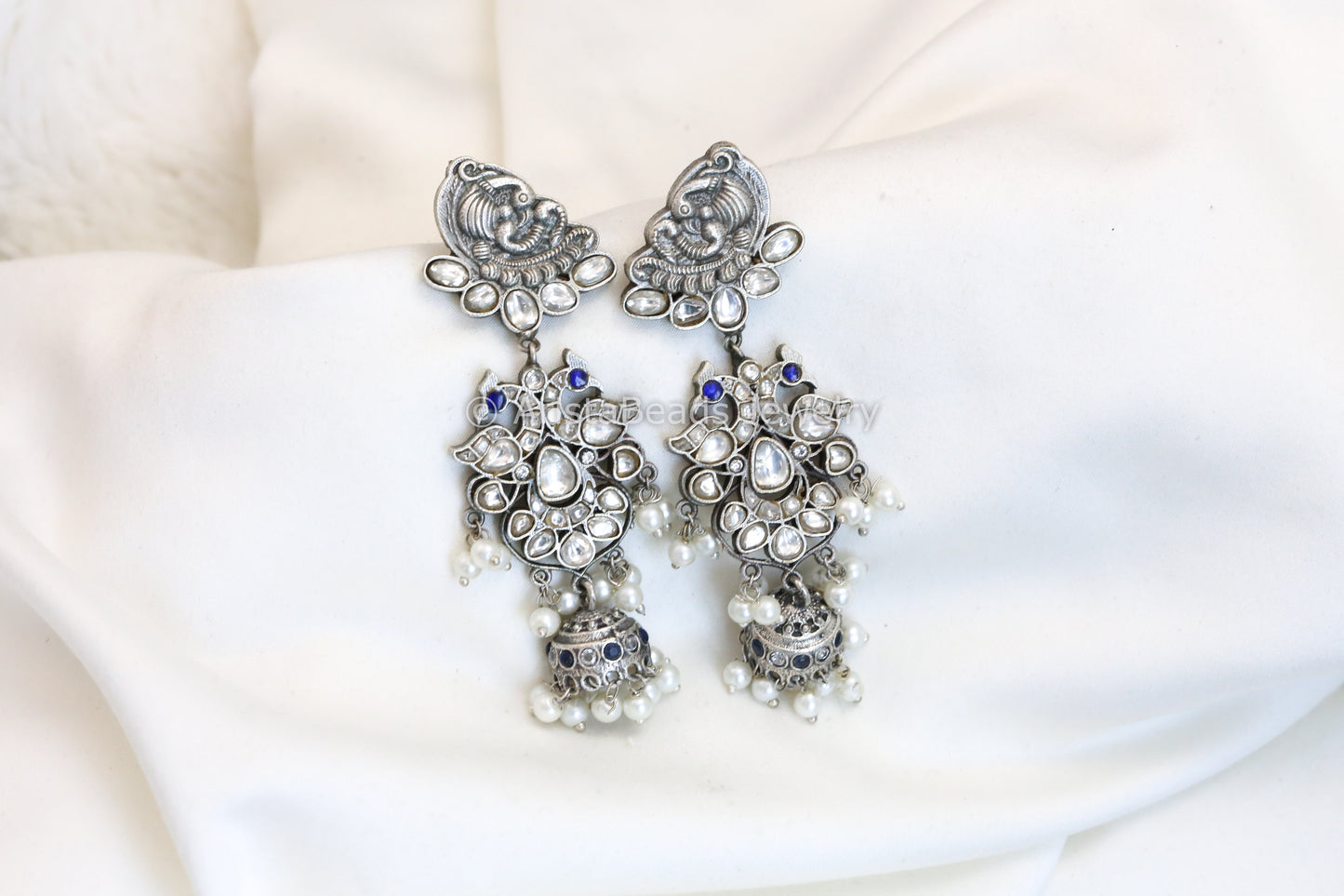 Jadau Jhumka In Silver Finish - Clear