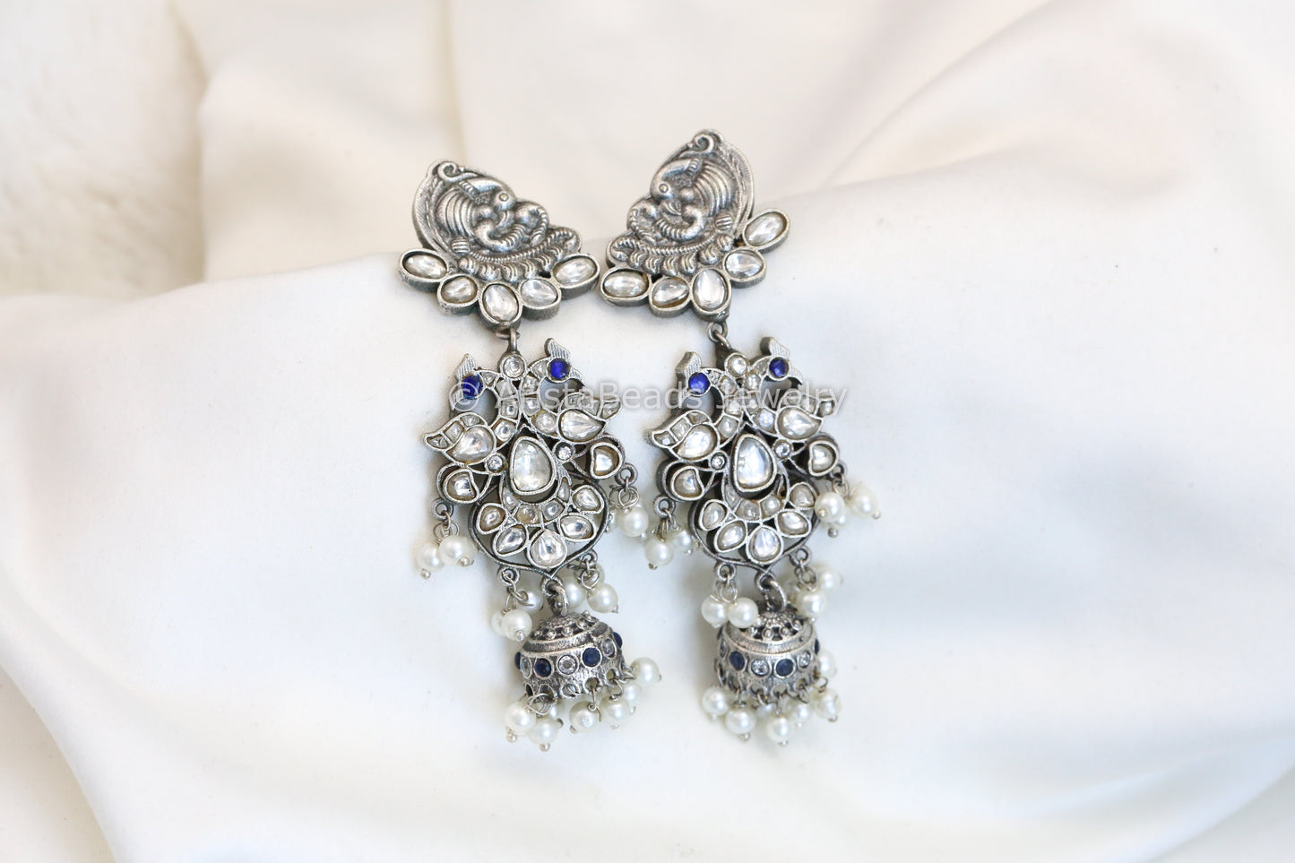 Jadau Jhumka In Silver Finish - Clear