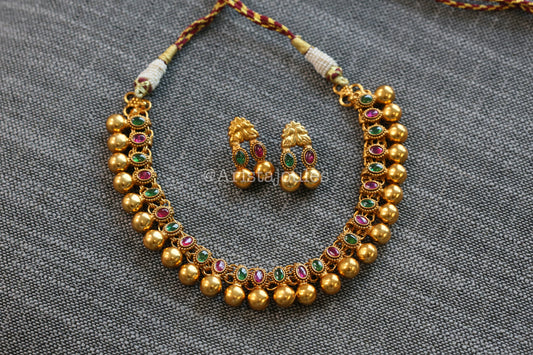 Rohini Antique Gold Kundan Necklace Set - Green Ruby