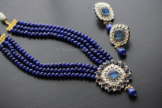 Foil Kundan Polki Carved Stone Necklace Set - Blue